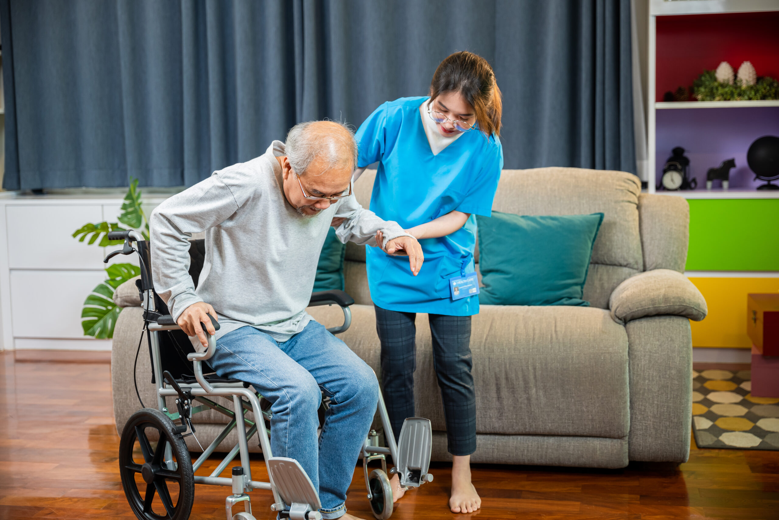 Home caregiver supporting a senior with meal preparation